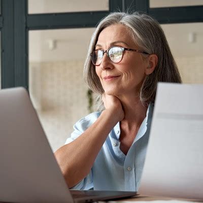 Senior couple reviewing Medicare enrollment timeline